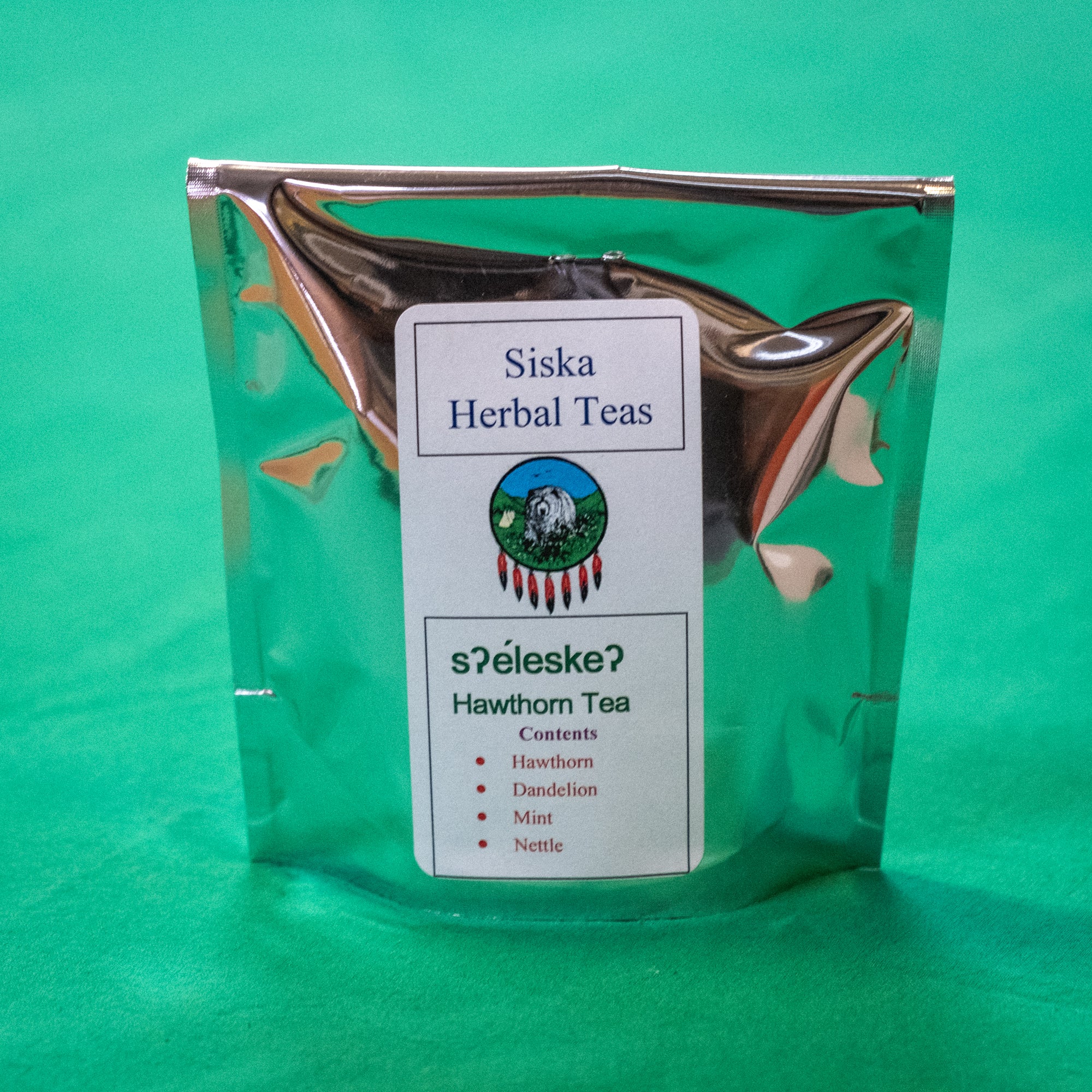A pack of tea, label says "Siska Herbal Teas. Hawthorn Tea. Content hawthorn, dandelion, mint, nettle." End of image description.